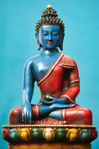 Opnå glæde og fredfuldhed med en Buddha figur